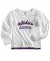 For the creative little girl, this long sleeve t-shirt by adidas is artistically styled with peaceful graphics.