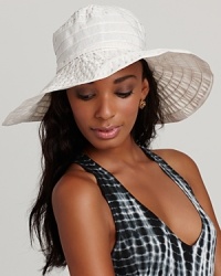 A lightweight ribbon crusher hat with ribbon tie, a perfect accessory for the jet-setting girl.