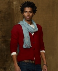 Mended with colorful patterned patches, a V-neck wool cardigan blends a handsome silhouette with an electic vibe for your unique style.