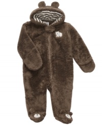 Wrap him in a warm bear hug with this sweet and cuddly microfleece footed coverall from Carter's.