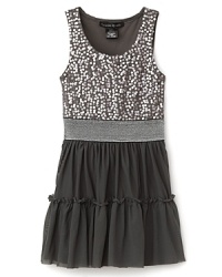 Starlight silver sequins and a sparkling elasticized waistband in a seasonal gray hue dazzle this Flowers by Zoe dress.