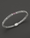 Bead-textured bracelet from Lagos in sterling silver, accented with pink sapphire.