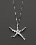 Gracefully undulating starfish pendant necklace with pave diamond clusters.