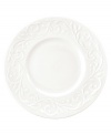 An elegant white-on-white pattern, embossed vine motif and interior glaze adorn these dessert plates from Lenox dinnerware. The dishes from the Opal Innocence Carved collection get your table set for refined dining every day.