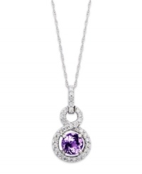 Shapely sophistication. This 14k white gold necklace features a stunning tanzanite (1/2 ct. t.w.) pendant surrounded by diamonds (1/5) for a look that adds glamour to any affair. Approximate length: 18 inches. Approximate drop: 1/2 inch.