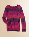 Glittery sparkles top this long-sleeve design with wide horizontal stripes in rich berry hues. ScoopneckLong sleevesBanded hemPullover styleBody: rayon/lurexTrim: modal/cottonMachine washImported