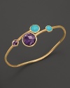 Turquoise and amethyst lend bold color to this modern brushed gold bangle from Marco Bicego.