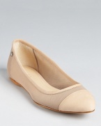 In sheer mesh, these nude Calvin Klein flats boast sophisticated style that pairs with anything and everything.