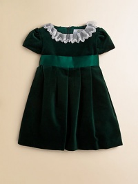 A delicate lace collar adorns the neckline of this plush velvet frock with matching satin sash for a party-perfect look.Lace collarShort puff sleevesBack zipperWaistband with satin sashPleated skirtCottonMachine washImported