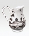 A winsome yet modern pitcher features age-old decorative techniques in fine stoneware, lending a dash of adventure to any culinary creation. From the Country Estate CollectionCeramic stoneware3 oz. capacity3½ highDishwasher- & microwave-safeImported