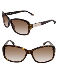 Stylish sunglasses with a rectangular logo plaque at temples for the ultimate MICHAEL Michael Kors look.