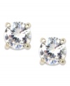 Glittery and glamorous, these stud earrings from Anne Klein are an absolute dream with bezel-set glass stones. Set in silver tone mixed metal. Approximate diameter: 1/4 inch.