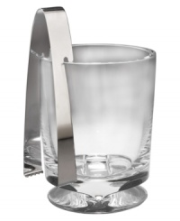 Nambe's new Groove. This brilliant, solid crystal ice bucket refracts light and stays put on a cinched base built for stability. Bold, masculine and perfectly at home in modern decor. Smart tongs fit right in, sliding over the bucket's edge.