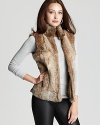 Plush rabbit fur lends undeniable glamour to this MICHAEL Michael Kors vest--a luxe statement for the new season.