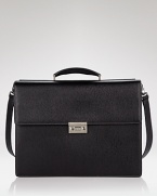 Salvatore Ferragamo Revival double gusset briefcase. Textured leather briefcase with lock combination on front. Features topstitching detailing, internal pockets and expandable folders on side.