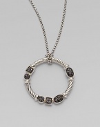 From the Confetti Collection. A sterling silver cabled wreath, hanging from a pretty box chain, is dotted with black pavé diamonds in sparkling geometric shapes. Diamonds, 0.14 tcw Sterling silver and rhodium plating Chain length, about 16 Pendant diameter, about 1 Lobster clasp Imported