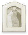 Capture your most magical moment in this medium sized, porcelain frame.  Scalloped edges and a luminous finish combine for a truly elegant effect.