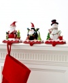 A stocking full of personality. Topped with a clay figurine of a penguin, Santa or snowman, these too-cute stocking holders keep gifts hanging, balancing the weight on a cast iron base.