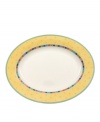 Spice up your main disheds with the Twist Alea oval platter. The bright enamel colorblock design is a perfect contrast to the fine white china. Features a vivid band of color along the rim.