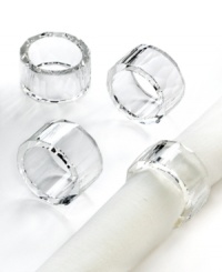 Enhance linens of any color and pattern with Jackie napkin rings from Oleg Cassini. Heavy crystal with bold faceted cuts adds designer shine to well-dressed tables. A beautiful gift for the perpetual host or bride-to-be.