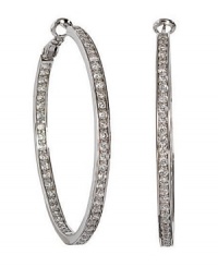 Dazzling round-cut cubic zirconias (2 ct. t.w.) line every side of these gorgeous CRISLU hoop earrings set in sterling silver with a platinum finish. Approximate diameter: 1-3/4 inches.