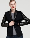 Fashion meets function in this Marc by Marc Jacobs wool and leather combo blazer. Wear it to work or with a weekend outfit and jeans.