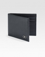 Single fold wallet rendered in luxuriously textured, Italian calfskin leather with double gancini silver ornament accent for a signature finish.One bill compartmentSix card slotsLeather4W x 3HMade in Italy