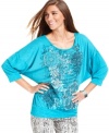 Airy dolman sleeves and a banded hem create a relaxed silhouette for this easy-to-wear Style&co.'s petite top!