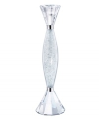 Dramatic rays of light sparkle throughout the length of this Swarovski crystal candleholder. A stunning table-topper that complements the rest of the Crystalline Stemware collection. 9 tall.