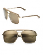 Sleek metal aviators with leather trim. Available in gold with gold mirror lens. 100% UV protection Made in Italy 