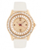 A new neutral for when you want to kick things into gear, by Betsey Johnson. Watch crafted of beige leather strap and round rose-gold tone stainless steel case. Bezel embellished with crystal accents. Textured rose-gold tone dial features ring of baguette-cut crystal accents, applied rose-gold tone Roman numerals at twelve and six o'clock, dot markers at three and nine o'clock, luminous hour and minute hands, signature fuchsia second hand and logo at twelve o'clock. Quartz movement. Water resistant to 30 meters. Two-year limited warranty.