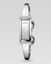 From the G-Frame Collection. A streamlined stainless steel timepiece with diamond and horsebit accents.Quartz movement Water resistant to 3 ATM Rectangular stainless steel case, 34mm x 14mm, (1.33 x .55) Sapphire crystal Diamonds along top and bottom case, 0.10 tcw Stainless steel bangle Jewelry clasp closure Made in Switzerland 