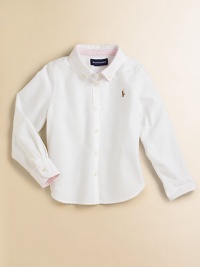 An all-season favorite and wardrobe essential in soft cotton oxford. Button-down collar Long sleeves with button barrel cuffs Button placket Embroidered polo pony logo Back yoke and box pleat Shirttail hem Cotton Machine wash Imported Please note: Number of buttons may vary depending on size ordered. 