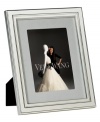 Always look elegant within the Chime picture frame from Vera Wang. Luxe silver plate with clean lines and beveled edges makes a lasting impression all its own. Interior rim features classic ribbed detail.