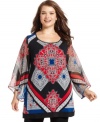 Electrify your leggings with Style&co.'s three-quarter-sleeve plus size tunic top, broadcasting a bold print. (Clearance)