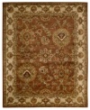 Rich with color and refined floral motifs, this Nourison area rug offers luxury for any space. Soft, durable wool is tufted by hand and herbal-washed for a beautiful, heirloom-quality texture and sheen.