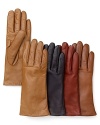 Chic short leather gloves with luxuriously soft cashmere lining. Exclusively at Bloomingdales.