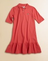 A favorite polo becomes a sweet dress with a feminine ruffle, in airy pique knit.Ribbed polo collarElbow-length sleeves with ribbed cuffsButton placketAppliqued logo on chestWide ruffle at hemCottonMachine washImported Please note: Number of buttons may vary depending on size ordered. 