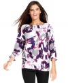 Add a splash of color to casual ensembles in JM Collection's printed blouson-style top.