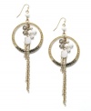 Inspired by the intricate design of a dream catcher, INC International Concepts' bohemian drop earrings feature pave-cut circles decorated with white plastic and black glass beads. Set in gold-plated mixed metal. Approximate drop: 4-1/2 inches.