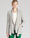 This lightweight blazer by REISS offers a seamless transition to fall, flaunting a fluid fit, deep v neckline and a feminine silhouette. Throw it on over skinny jeans or tapered trousers for laid-back luxe.