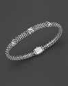 Silver Xs mark the spot on Lagos' gorgeously textured sterling silver bracelet.