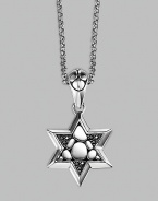 A stunningly appointed Star of David pendant, accented by black sapphires on a silver chain necklace. From the Kali Collection Silver Black sapphires, 0.216 tcw Pendant, ¾W X 1½H Necklace, 36 long Lobster clasp Imported 