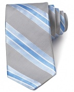 In a calm, traditional palette, this handsomely striped tie from Ike Behar lends a sophisticated look.