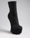 Museum quality, these Giuseppe Zanotti boots are a modern work of art, with a sculptural, gravity defying design.