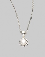 From the Luna Collection. A round pearl pendant with fluted border is suspended on an adjustable chain link.Pearl Sterling silver Length, about 16 - 18 Pendant width, about ½ Pendant length, about 1 Lobster clasp closure Imported 