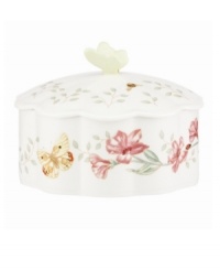 Spring is perpetually in season with the whimsical Butterfly Meadow trinket box from Lenox. Colorful blooms and butterflies on scalloped white porcelain lend country charm to any setting. Topped with a sculpted butterfly.