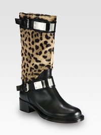 Lush pony hair takes on an exotic print in this leather staple with sleek metal accents and buckle straps. Stacked heel, 1¾ (45mm)Shaft, 11Leg circumference, 13½Leopard-print pony hair and leather upperPull-on style with adjustable buckle strapsLeather lining and solePadded insoleMade in Italy