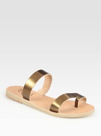 Soft leather footbed topped with glistening metallic leather straps and an unexpected toe ring. Metallic leather upperLeather lining and soleMade in GreeceOUR FIT MODEL RECOMMENDS ordering true whole size; ½ sizes should order the next whole size up. 