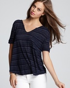 Featuring muted stripes, this Fresh Laundry tee drapes perfectly on the frame.